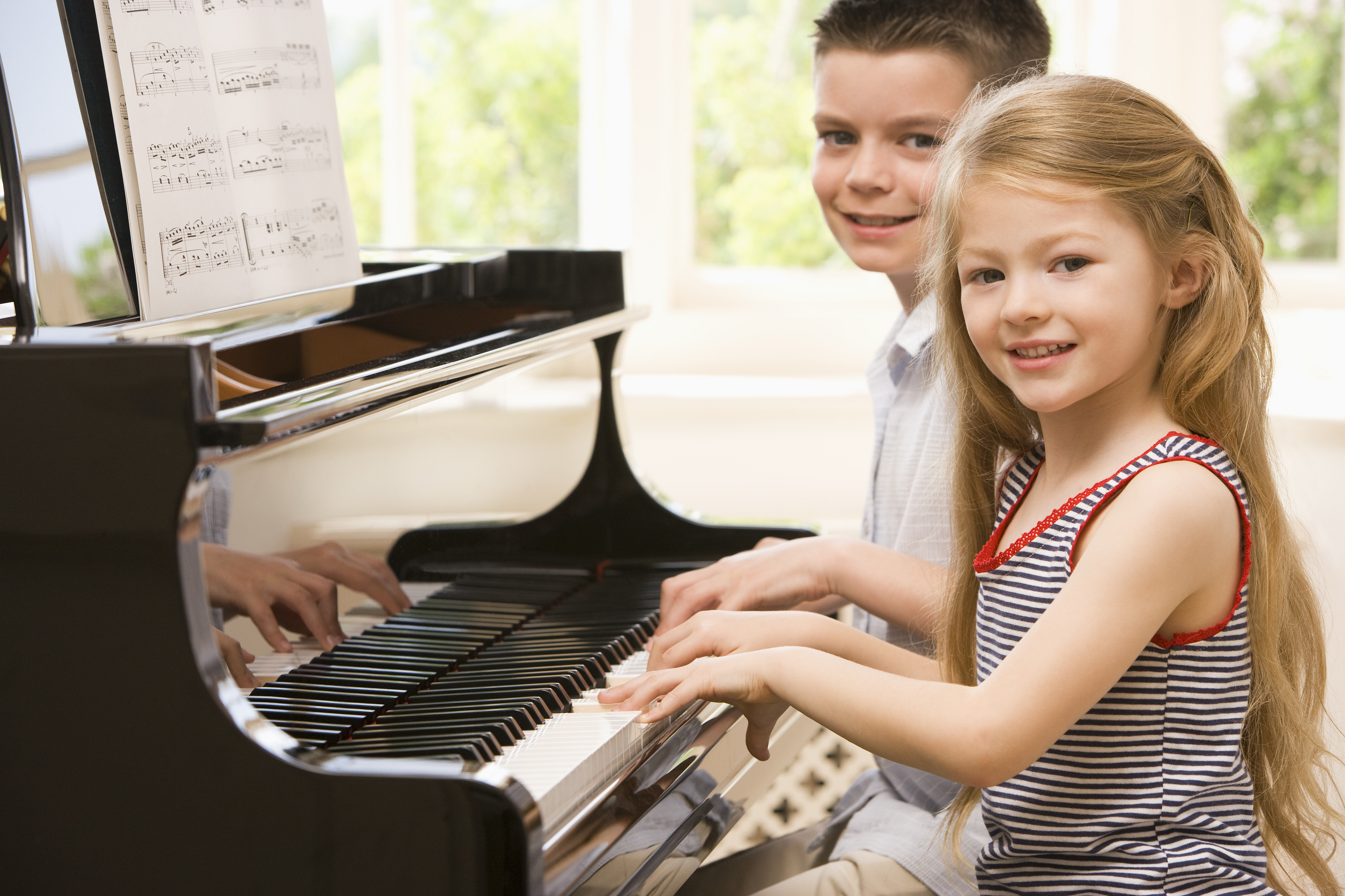 kids playing piano